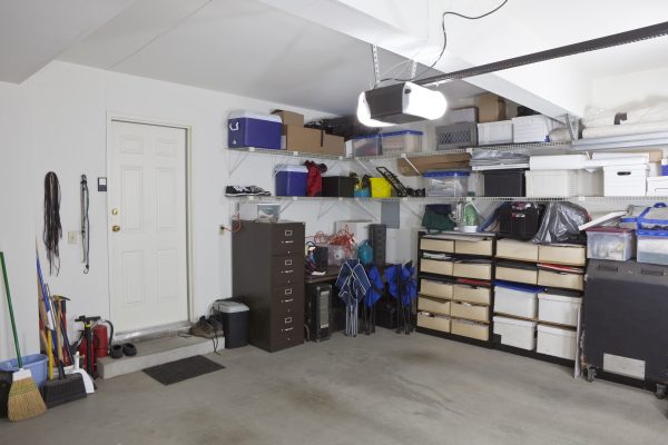 Neat and tidy home garage with storage
