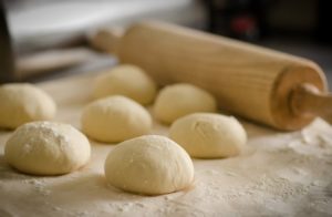 Baker preparing bread