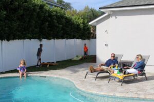 Family enjoying outdoor fun protected by Mosquito Control Treatments